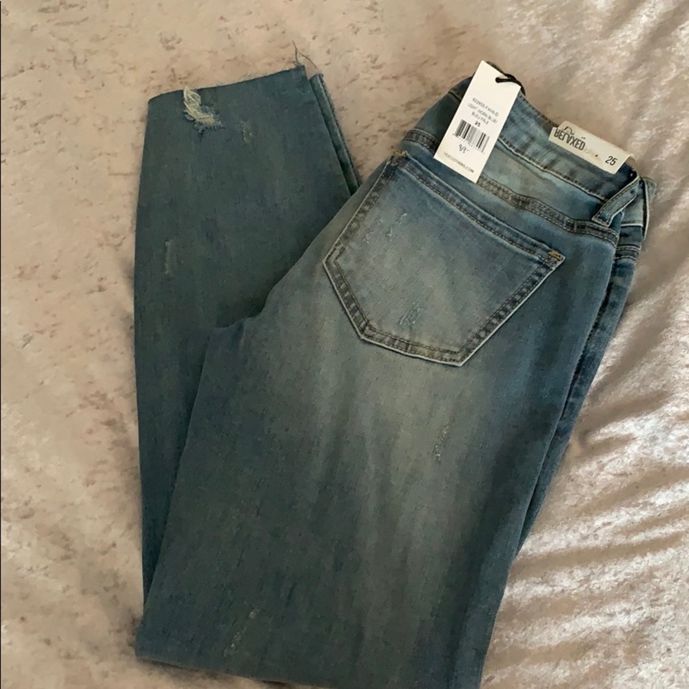 Light blue cropped distressed jeans